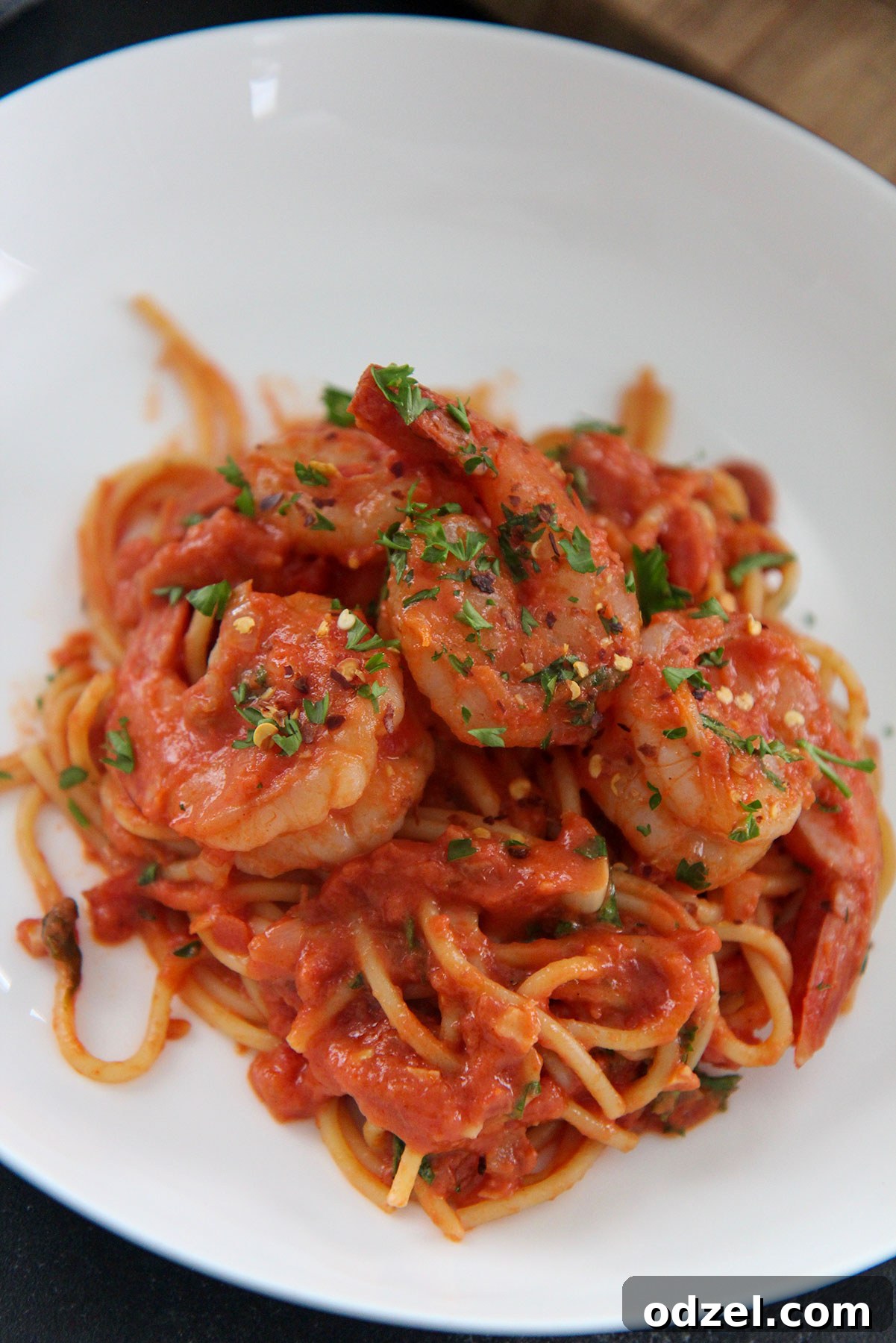 white bowl with seafood pasta up close 