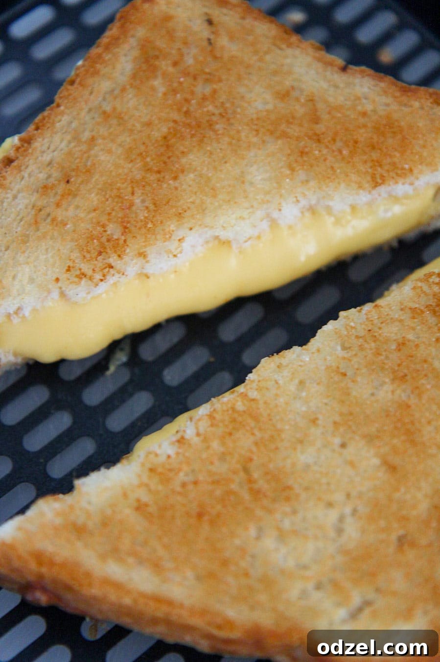 grilled cheese on the air fryer basket.