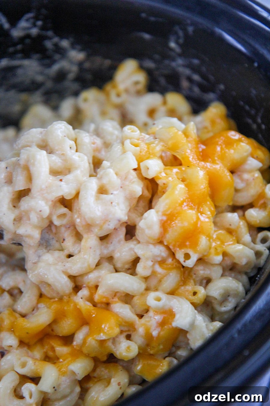 creamy macaroni and cheese cooked in the slow cooker.
