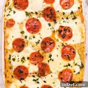 pizza lasagna in a red casserole
