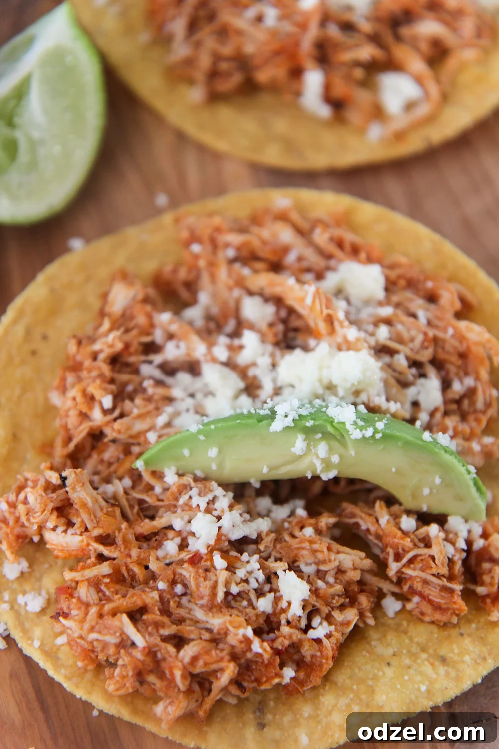 Smoky Instant Pot Chicken Tinga 5 instant pot chicken tinga tostada up close.