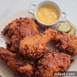 buttermilk fried chicken on a plate.