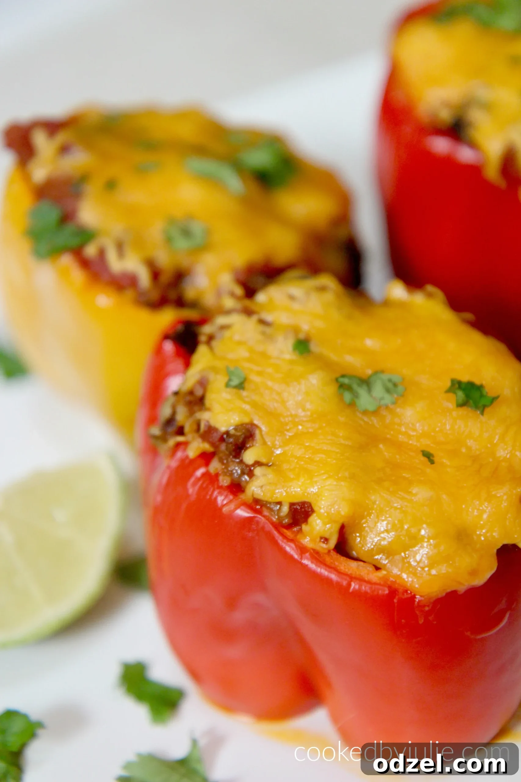 These taco stuffed peppers are a super easy, cheesy, and delicious weeknight dinner