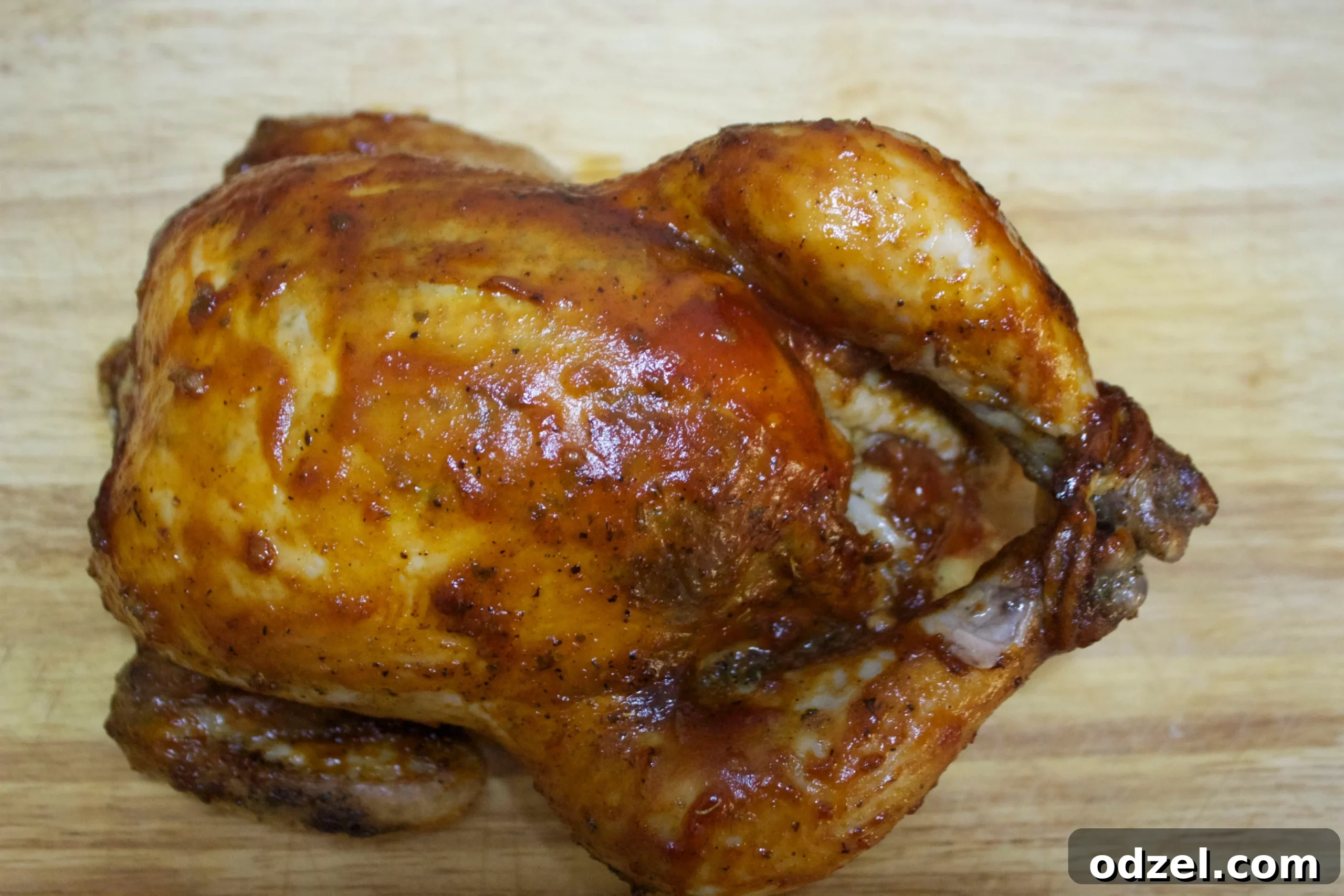 Grilled Chicken Fiesta 3 Close-up of tender, juicy barbecue roasted chicken with a glistening homemade sauce