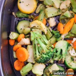 Crispy Air Fried Frozen Vegetables 2 Crispy air-fried frozen vegetables plated and ready to eat.