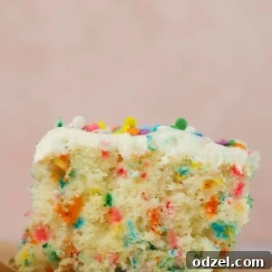 A slice of funfetti cake up close.