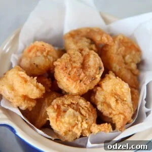fried shrimp in a blue small bowl