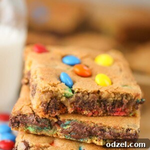 Colorful M&M's Chocolate Chip Cookie Bars 2 Three M&Ms chocolate chip cookie bars up close.