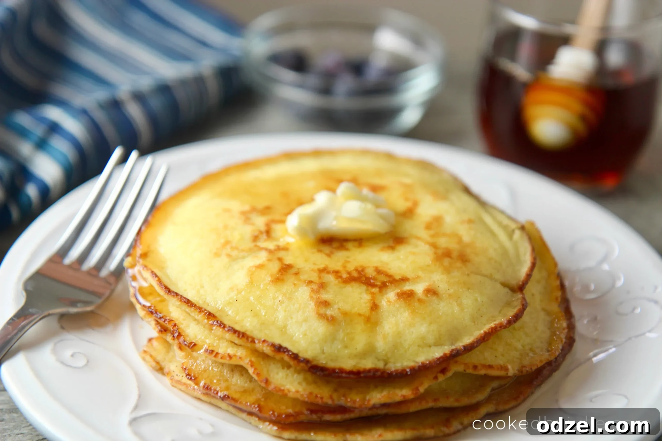 Easy 10-minute keto pancakes with sugar-free syrup and butter. 