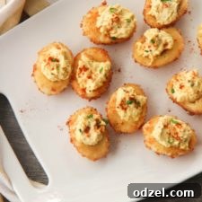 Crispy fried deviled eggs, a unique and delicious twist on a classic appetizer.