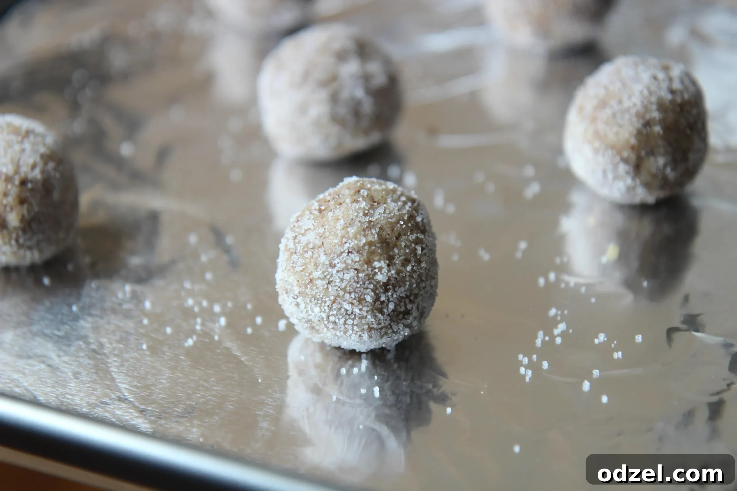 Close-up of keto sugar cookies, showcasing their unique texture and color