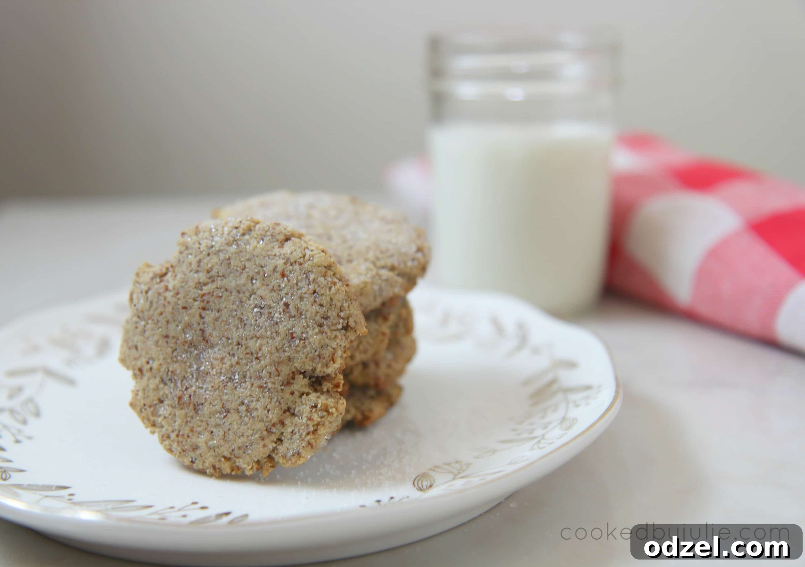 Keto friendly sugar cookies served with a glass of milk