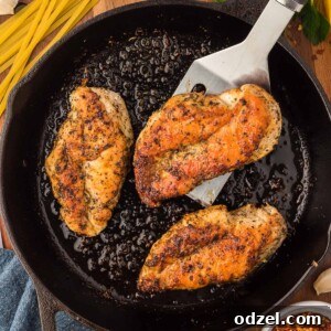 Golden Skillet Chicken 2 A dish of pan-seared chicken breasts, ready to be served.