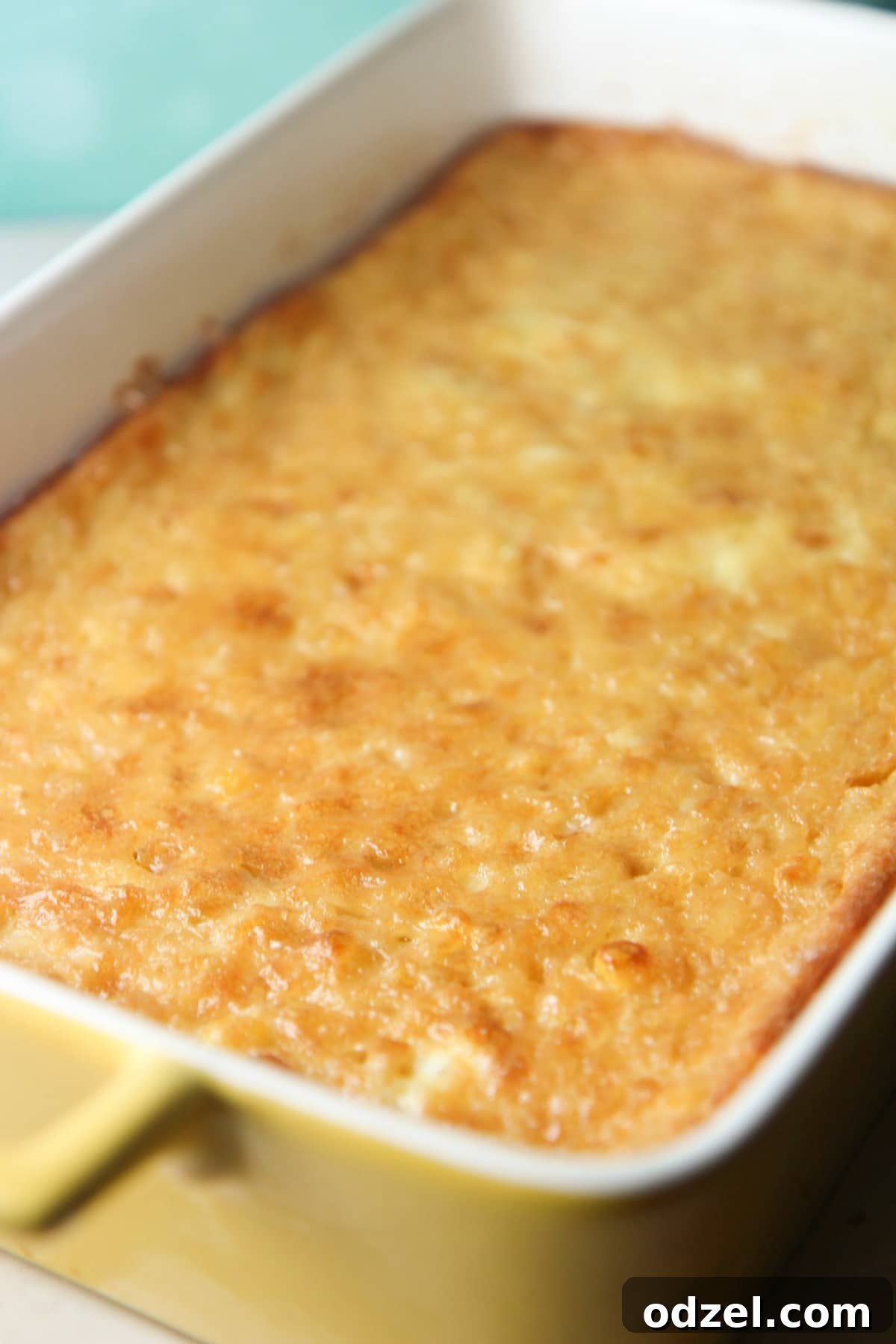 Homemade Corn Pudding Casserole, golden brown and ready to serve, a perfect Thanksgiving side dish.