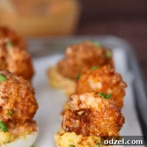 fried shrimp deviled eggs on a plate.