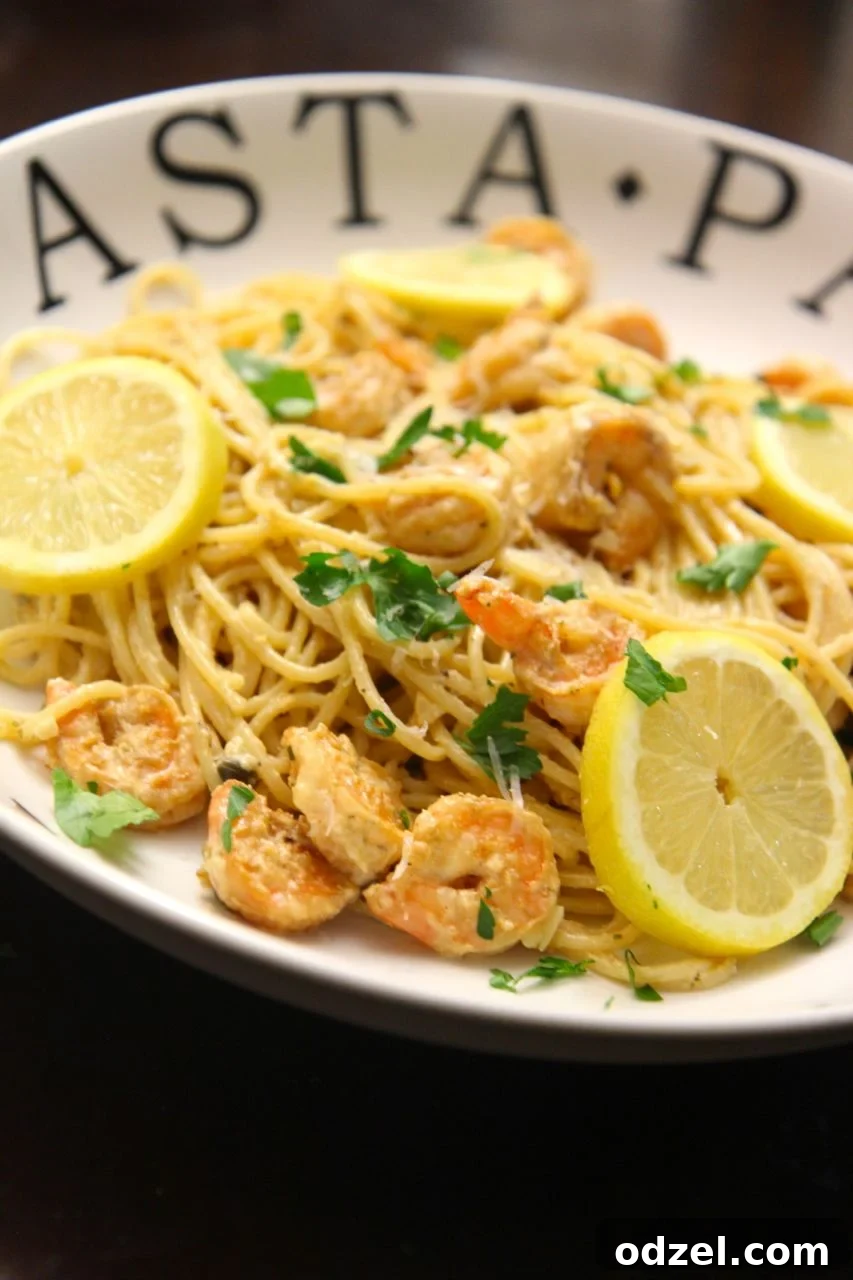Velvety Lemon Shrimp Pasta 3 Close-up of creamy lemon garlic pasta with perfectly cooked shrimp, ideal for a date night meal