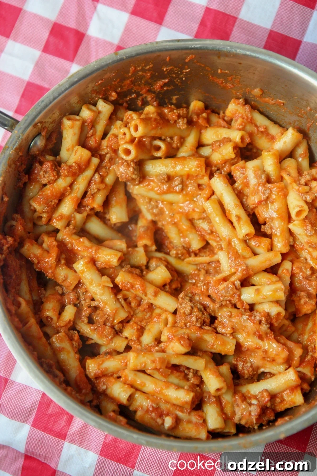Close-up of Beefaroni with melted cheese on top