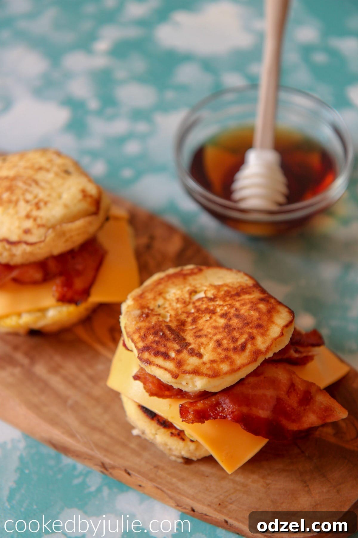 Gourmet Griddle Breakfast Sandwich 3 A close-up of multiple assembled McDonald's-style Keto Friendly Sandwiches, showing the layered ingredients.