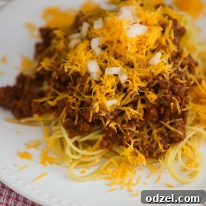 Cincinnati chili on a white plate.