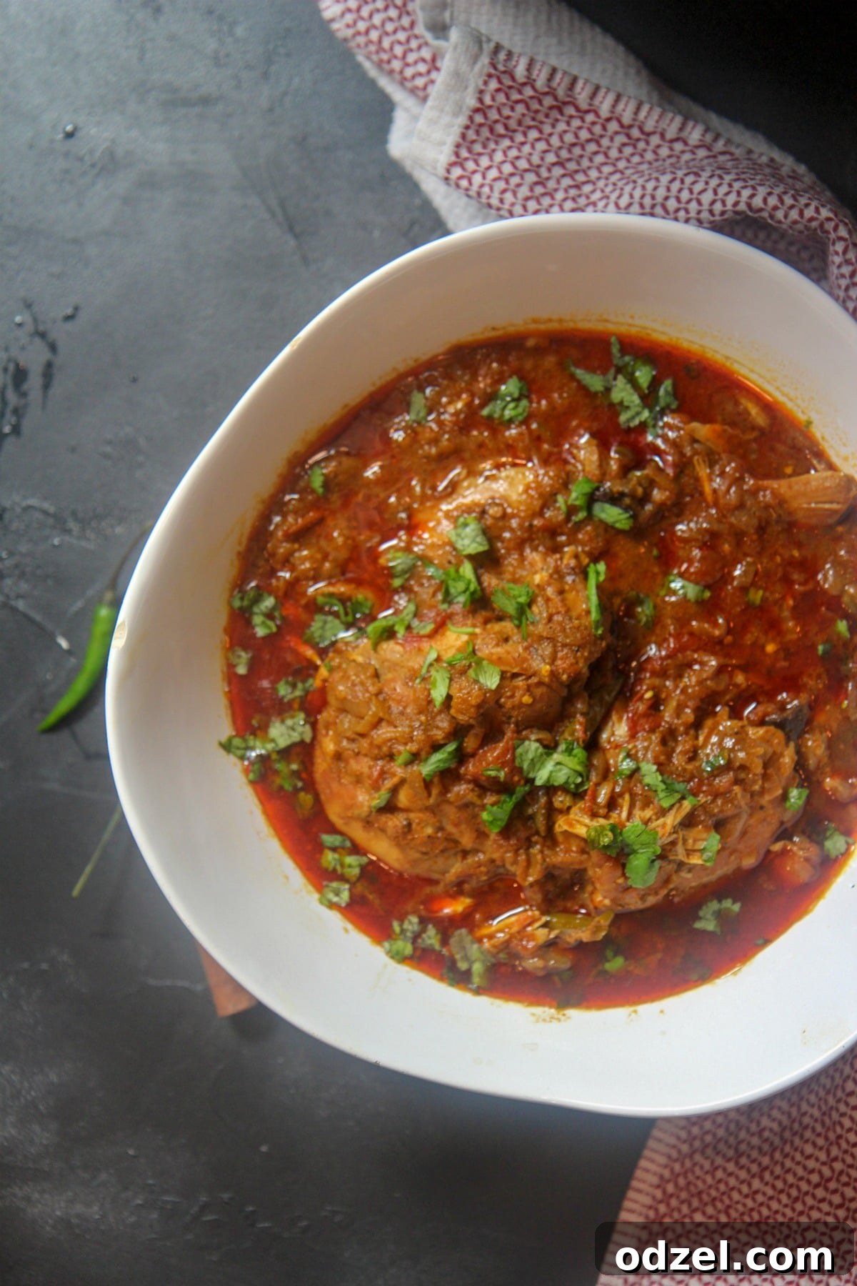 Delicious and quick Instant Pot Chicken Curry served in a bowl, garnished with fresh cilantro, ready to eat.