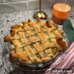Chicken pot pie with puff pastry in a 9-inch baking dish