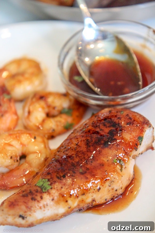 Skillet full of Jack Daniel's Chicken and Shrimp with sauce