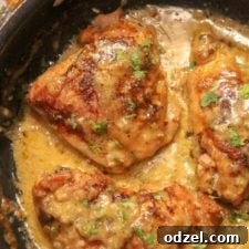 Smothered chicken thighs dish with rich cream sauce