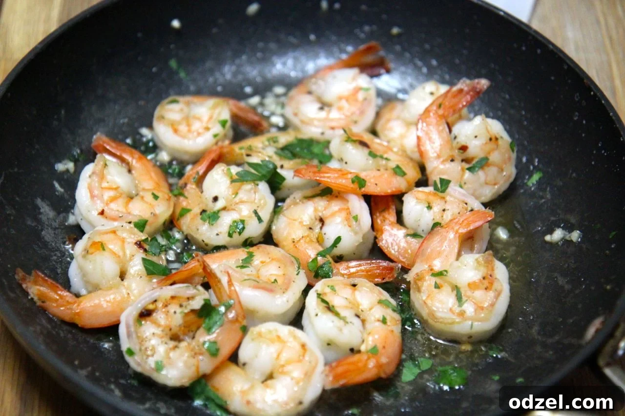 Delicious grilled garlic shrimp dinner with fresh parsley, ready in minutes. A perfect easy weeknight meal.