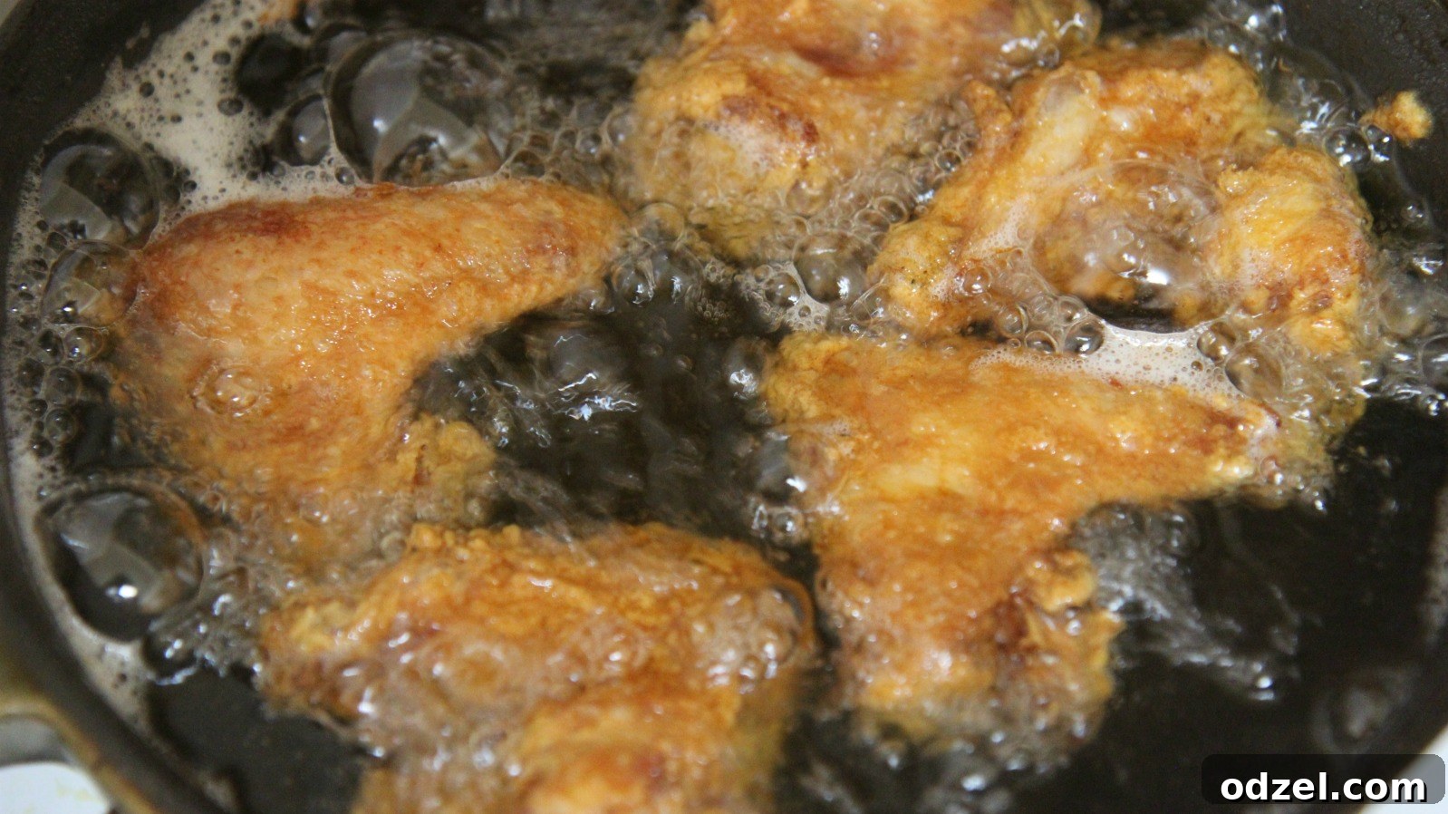 Irresistible Crispy Wings 3 Make sure you pat the chicken wings dry before deep frying to prevent splatter.