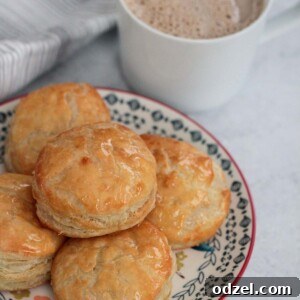 Cuban pastelitos de carne with a cup of coffee, ready to be enjoyed.