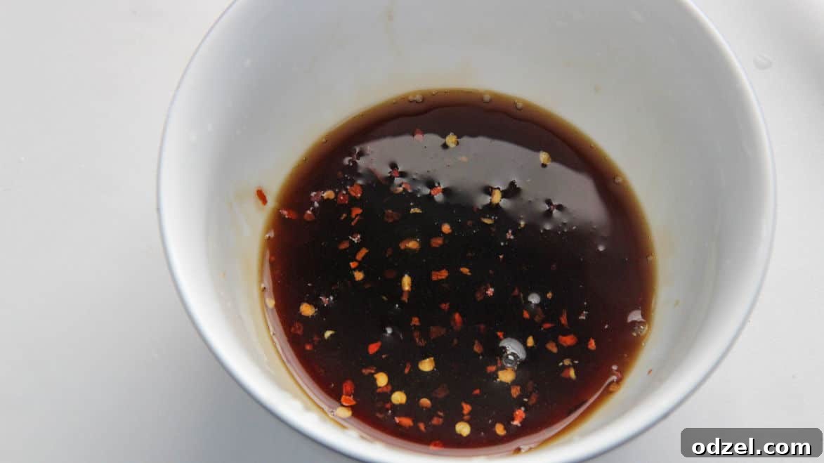 Homemade honey lime sauce in a white ceramic bowl