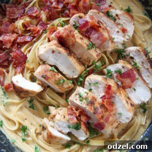 Creamy chicken and bacon pasta in a skillet