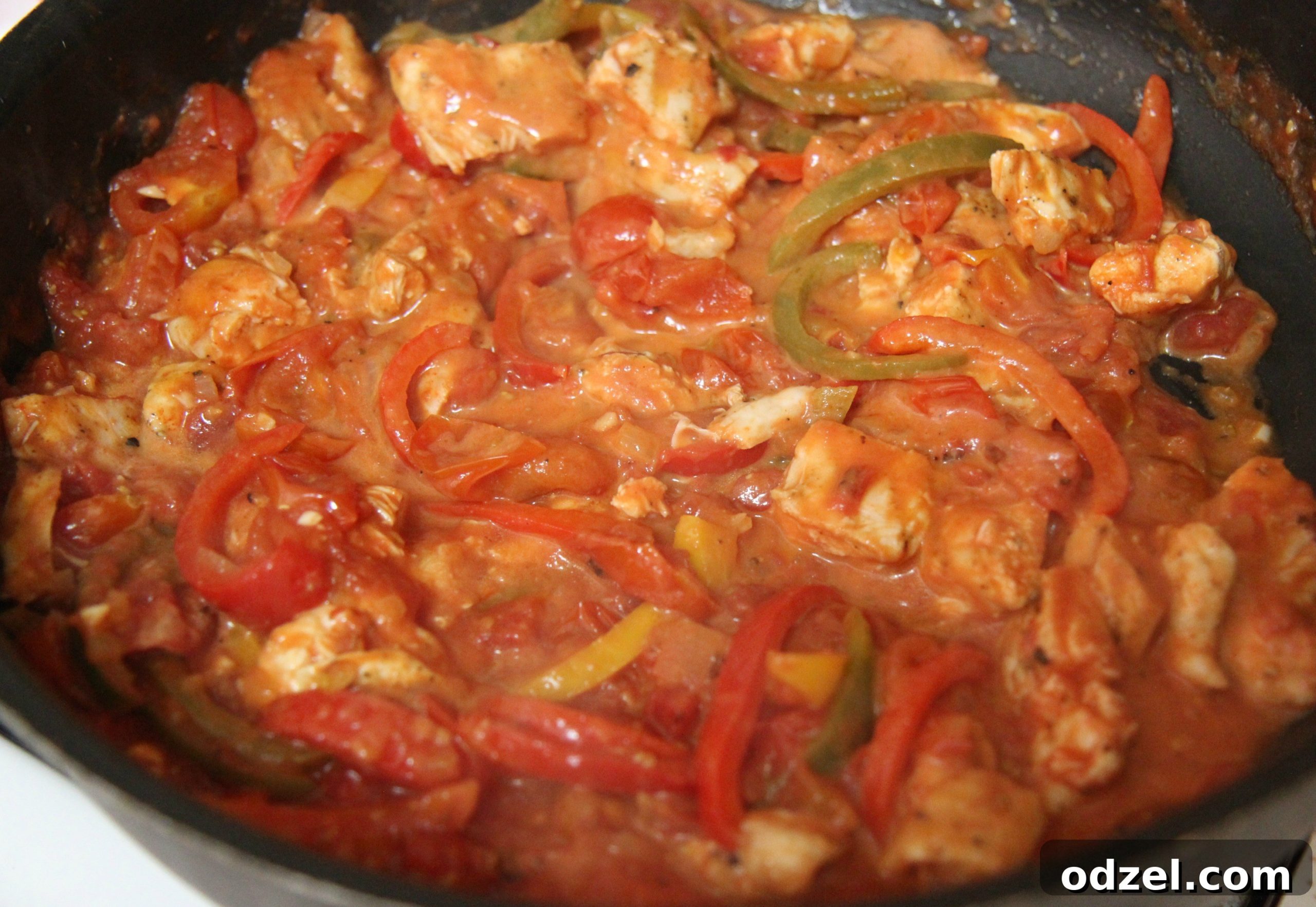 Add some heavy cream to help thicken the pasta sauce.