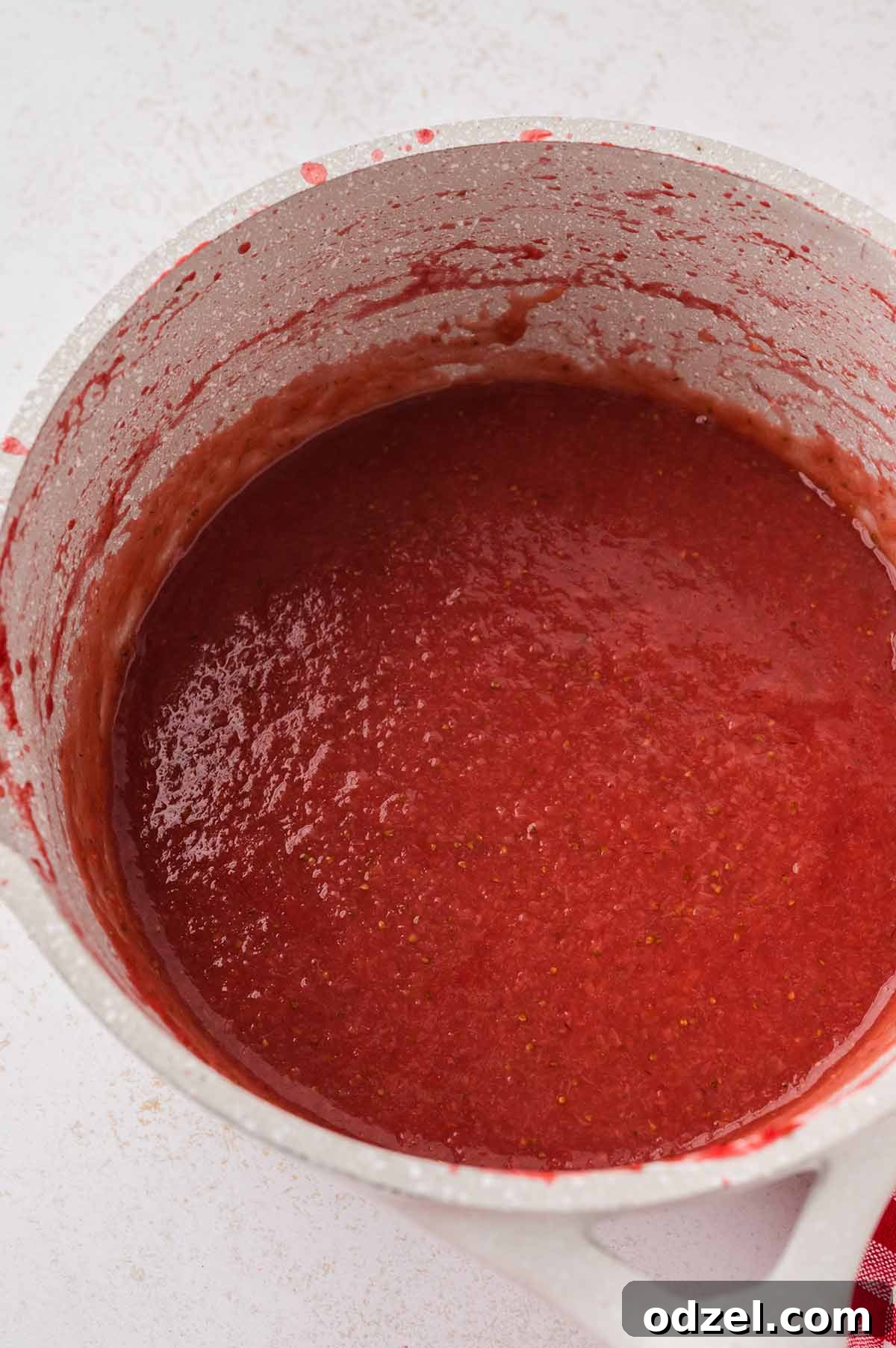 Moist Fresh Strawberry Sheet Cake Recipe 5 Strawberry puree in a saucepan.