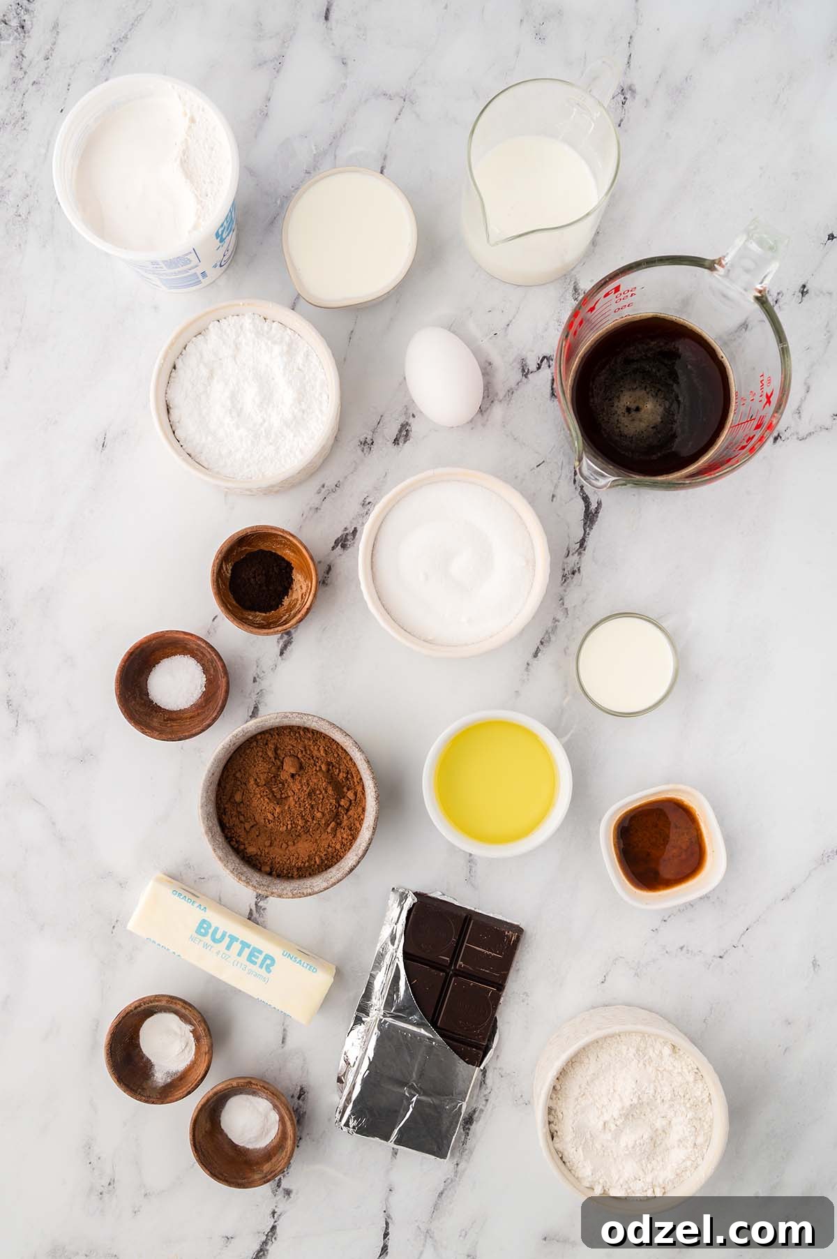 Gooey Marshmallow-Filled Chocolate Cupcakes 3 ingredients for chocolate cupcakes, ganache, and marshmallow cream.